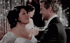 Man In Suit And Woman In Wedding Dress Dancing GIF