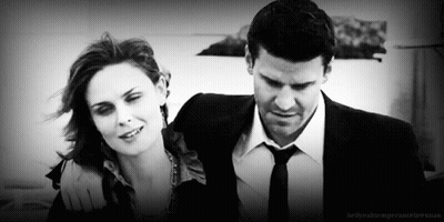 Man In Suit And Woman Standing Together GIF