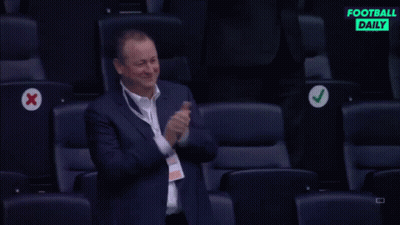 Man In Suit Applauding In Stadium GIF
