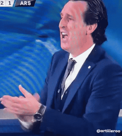 Man In Suit Applauding On TV Screen GIF