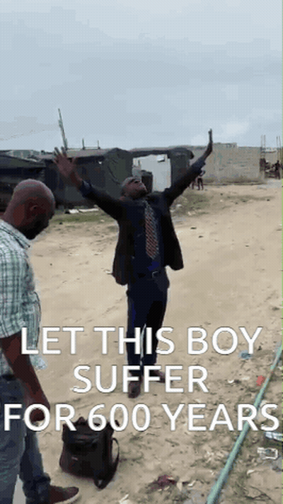 Man In Suit Arms Up Another Man Behind GIF