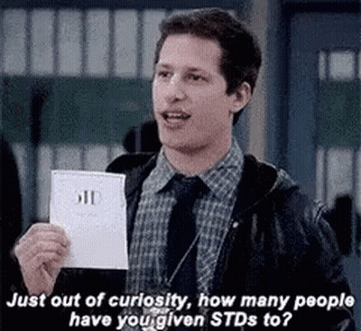 Man In Suit Asking How Many People Have STDs GIF