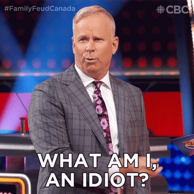 Man In Suit Asking What Am I An Idiot GIF