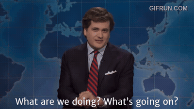 Man In Suit Asking What Are We Doing GIF