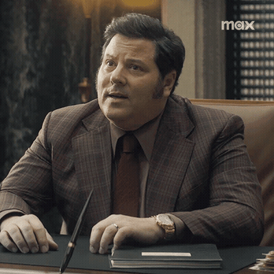 Man In Suit Asking What Does That Mean GIF
