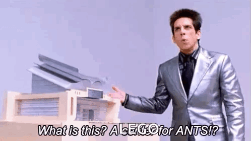 Man In Suit Asking What Is This GIF