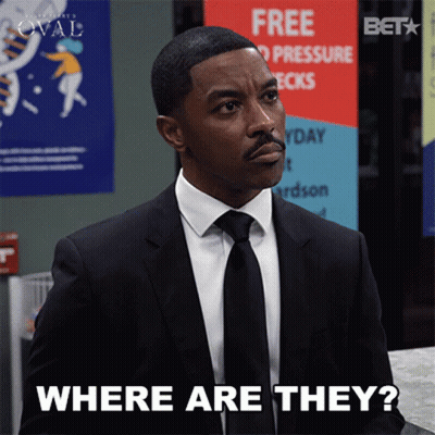 Man In Suit Asking Where Are They GIF