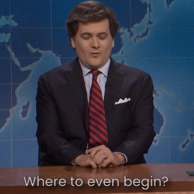 Man In Suit Asking Where To Even Begin GIF