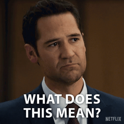 Man In Suit Asks What Does This Mean GIF