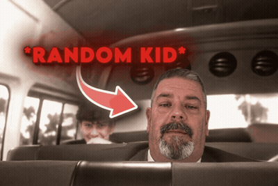 Man In Suit At Back Of Bus With Red Arrow Random Kid GIF