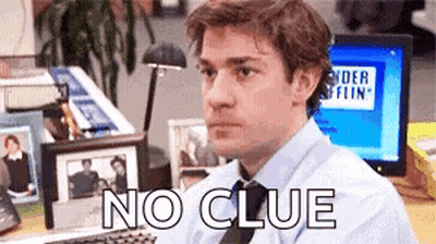 Man In Suit At Computer Saying No Clue GIF