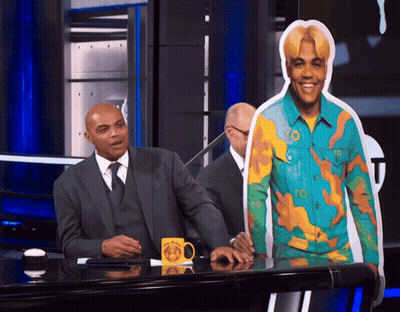 Man In Suit At Desk With NBA Mug GIF