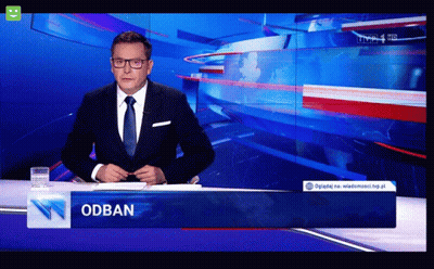 Man In Suit At Desk With Odban Sign GIF