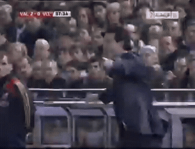 Man In Suit At Football Game GIF
