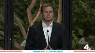 Man In Suit At Mayoral Debate GIF