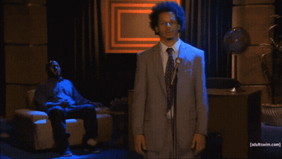 Man In Suit At Microphone Adult Swim.com GIF