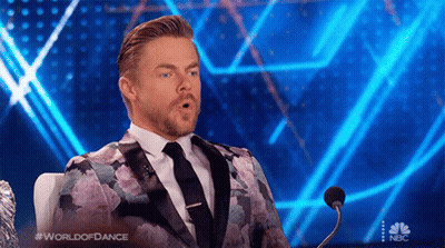 Man In Suit At Microphone World Of Dance GIF