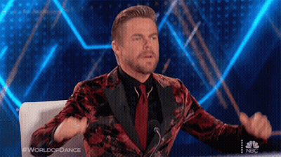 Man In Suit At Microphone World Of Dance GIF