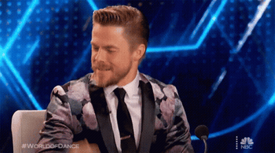 Man In Suit At Microphone World Of Dance GIF