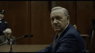 Man In Suit At Microphones Welcome To The Death Of The Age Of Reason GIF
