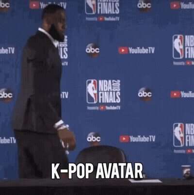 Man In Suit At NBA Finals Sign GIF