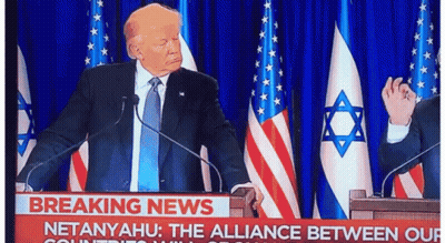 Man In Suit At Podium With Microphones Breaking News Sign GIF