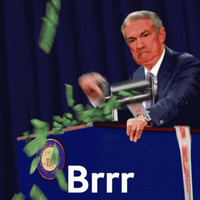 Man In Suit At Podium With Money Falling Brrr GIF