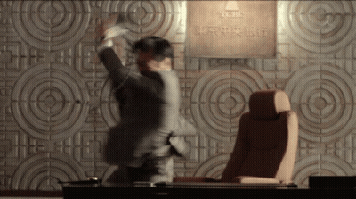 Man In Suit At TCCO Sign GIF