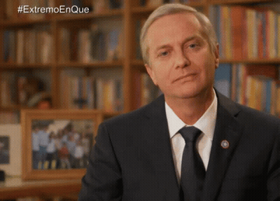 Man In Suit Before Bookshelf Hashtag Extremo Enque GIF