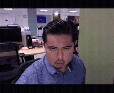 Man In Suit Before Fox News Banner GIF