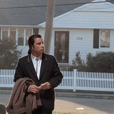 Man In Suit Before House 536 GIF