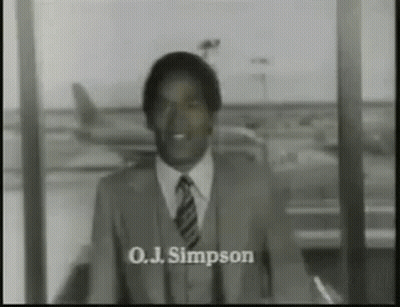 Man In Suit Before Police On Evening Express GIF