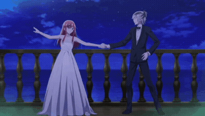 Man In Suit Bow Tie Kissing Red-Haired Woman GIF