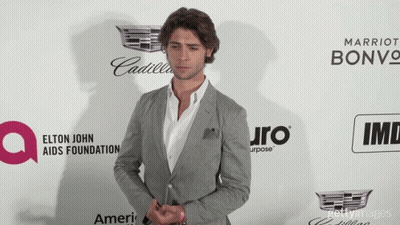 Man In Suit By Elton John AIDS Foundation Ad GIF