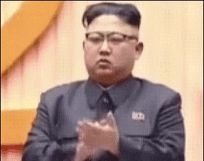Man In Suit Clapping Hands GIF