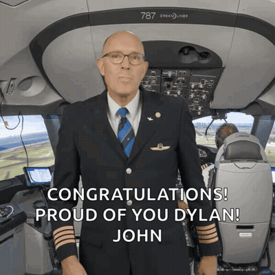 Man In Suit Congratulating Dylan GIF