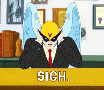Man In Suit Covering Ears Behind Sigh Sign GIF