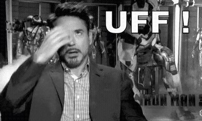 Man In Suit Covering Face Iron Man 3 Poster GIF