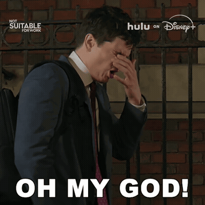 Man In Suit Covering Face Saying Oh My God GIF
