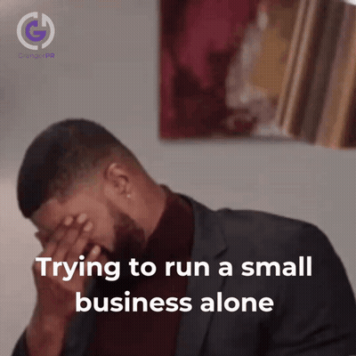 Man In Suit Covering Face Trying To Run Small Business Alone GIF