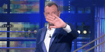 Man In Suit Covering Face With Hands GIF