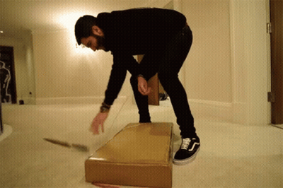 Man In Suit Cutting Birthday Cake With It's Your Birthday GIF