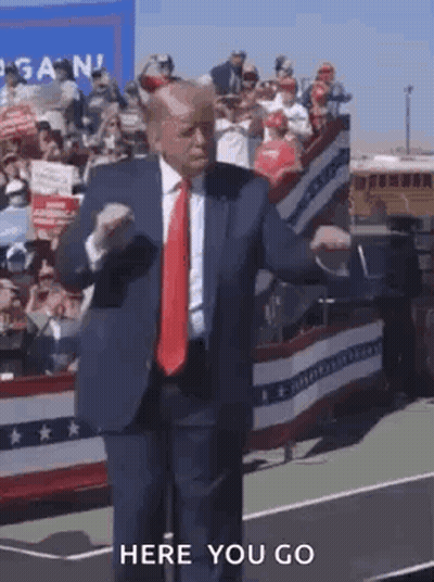 Man In Suit Dancing At Rally GIF