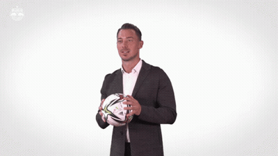 Man In Suit Dancing At Redbull Logo GIF