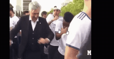 Man In Suit Dancing Before Group GIF