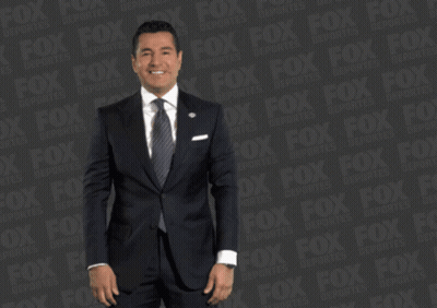 Man In Suit Dancing By Fox Logo GIF