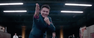 Man In Suit Dancing In Dark Room GIF