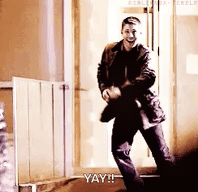 Man In Suit Dancing In Doorway Saying Yay GIF