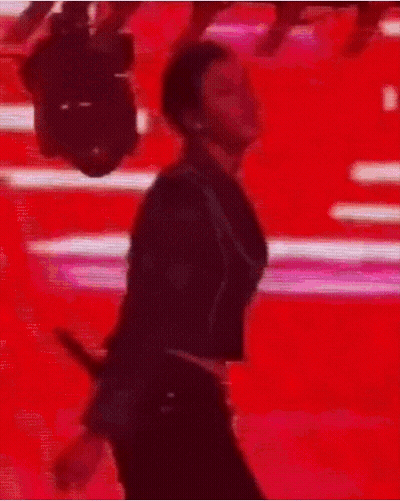 Man In Suit Dancing In Front Of Camera GIF