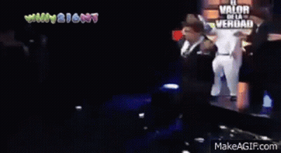 Man In Suit Dancing In Front Of Crowd GIF
